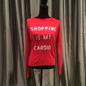 Red ‘Shopping Is My Cardio’ Sweater by Wildfox